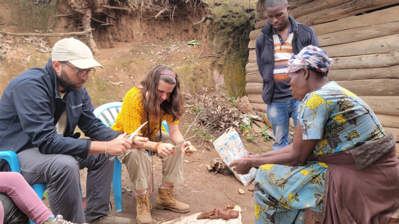 Ugandan village experience cooking with locals